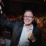 Kamil Hanáček receiving Influencer of the Year award at MPE 2025 Berlin